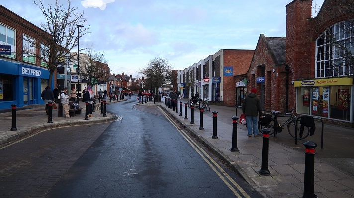 A view of the length of front street, taken from the view of a road user