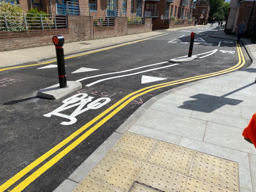 Improved safety of cycle lane with barriers and freshly painted markings
