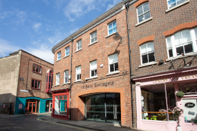 Photo of the outside of the 18 Back Swinegate property and the surrounding businesses