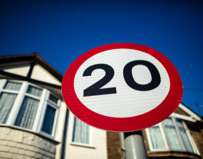 A photo of a 20 miles per hour speed sign