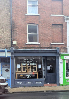 exterior photo of the shop frontage of 74 Gillygate
