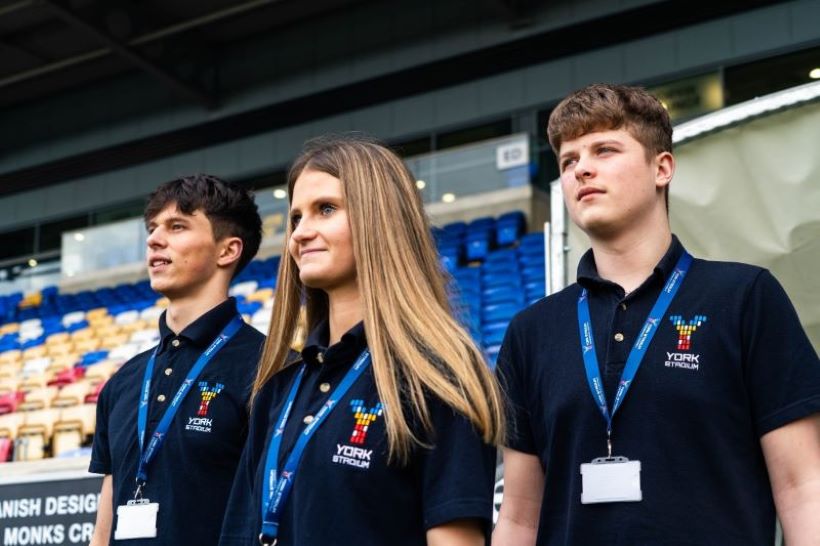 Young people in LNER community stadium uniform