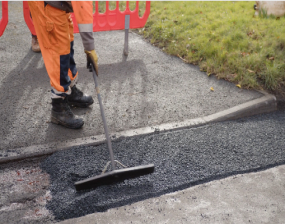 An image of a council worker repairing York's roads