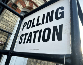 A banner says 'Polling Station'