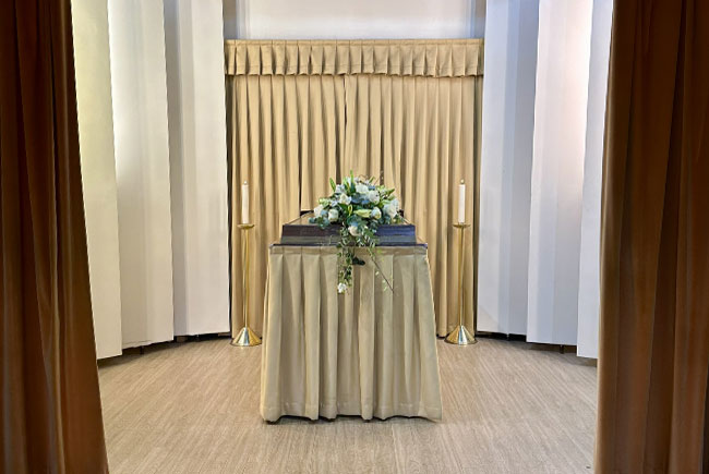 York Crematorium candles and catafalque in the White Rose Chapel