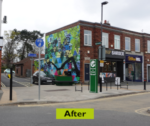 After the side of the barbershop on Acomb Front Street has been painted by Art of Protest