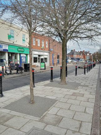 Acomb front street tree base after improvements