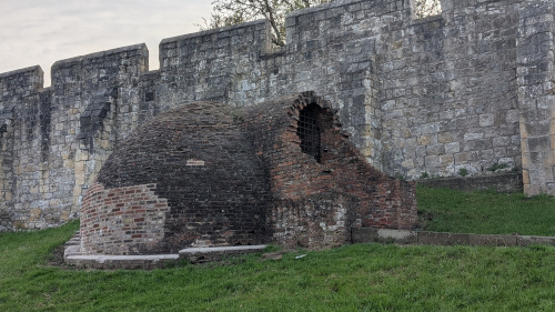 An image of the outside of the Ice-House along the bar walls