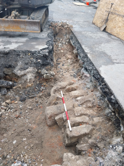 An image of the discovered city walls which were used as a base for the road