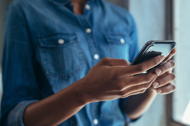 Person looking at their mobile phone