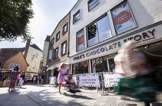 Families using public spaces in York city centre