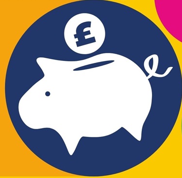 A piggy bank with a pound coin being inserted.