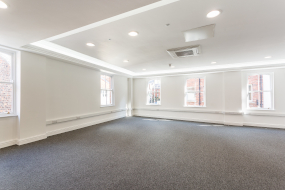Photo of the empty main office space in Suite 1D of 18 Back Swinegate, viewed from the entrance facing inwards