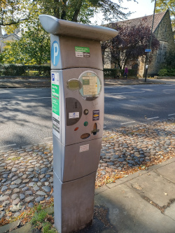 Car parking ticket machine on street