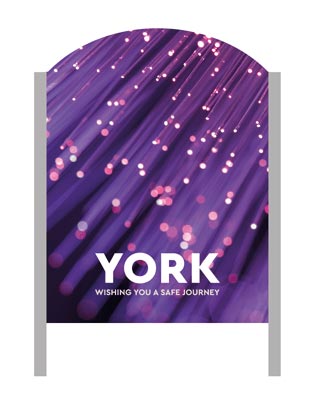 A 'Make It York' welcome sign with fibre optic cables in the background.
